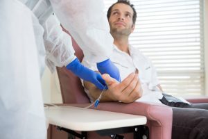 dentist administering iv sedation